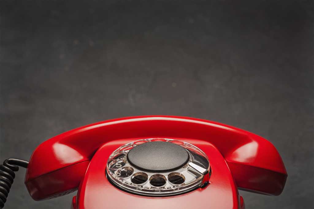 A photograph of a red phone.