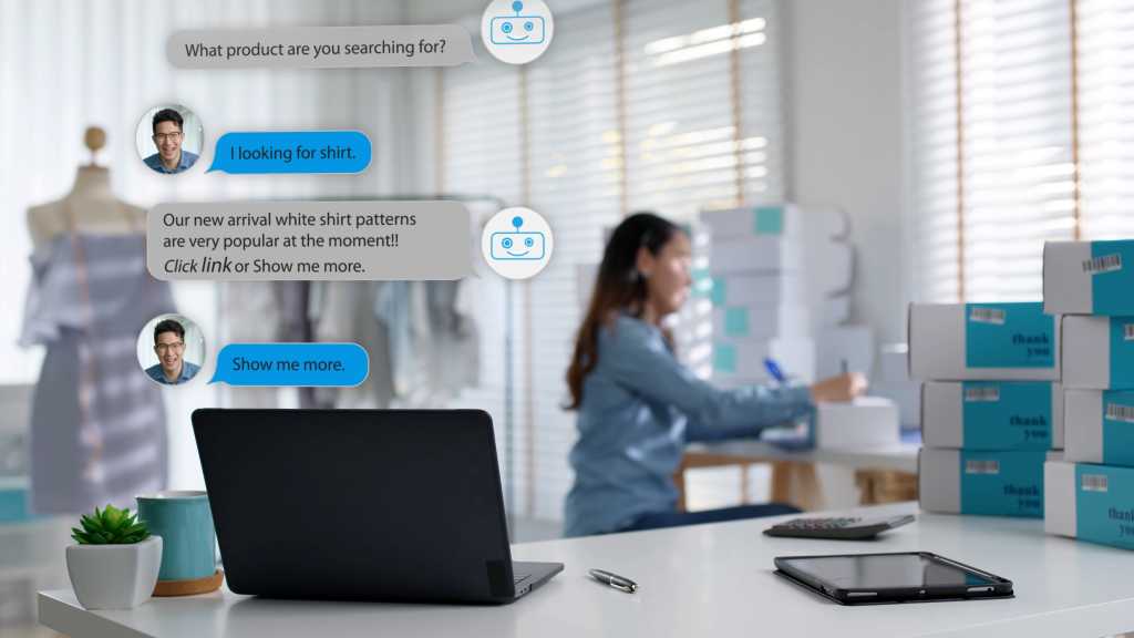 Chatbot conversation on laptop screen app interface with artificial intelligence technology providing virtual robotic assistant customer support and information for small business